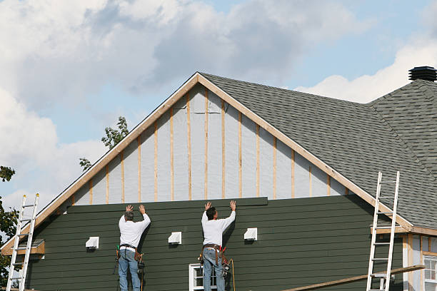 Professional Siding Contractor technician working in Pineville, NC
